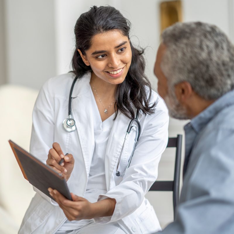Doctor consulting with patient
